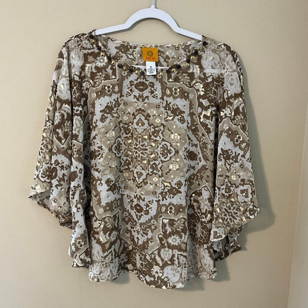 Rudy Rd. Kaleidoscope Pattern With Beaded Neckline And Circle Shape